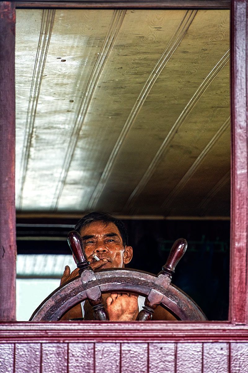 Vietnamese Captain on a ship cruise in Ha Long Bay