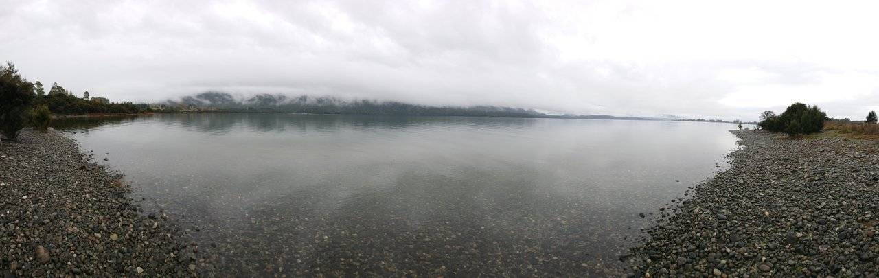 Panoramic from the east side of a cloudy Lake Te Anau
