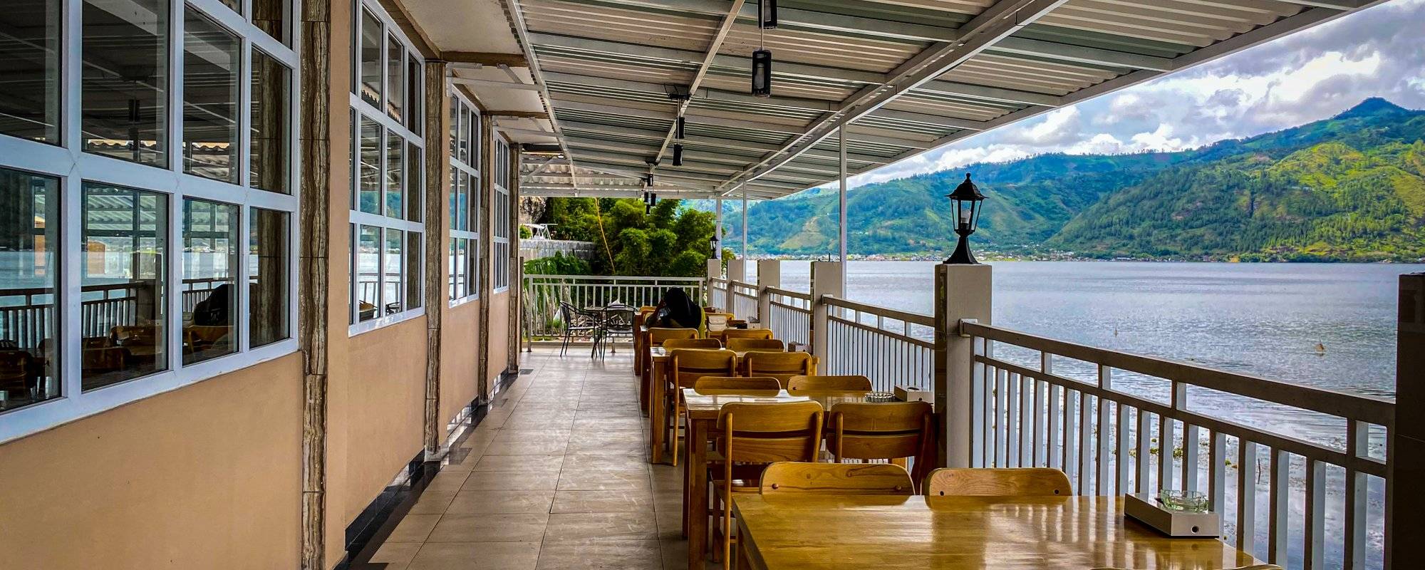 Enjoying Lake Views From The Grand Renggali Hotel Restaurant
