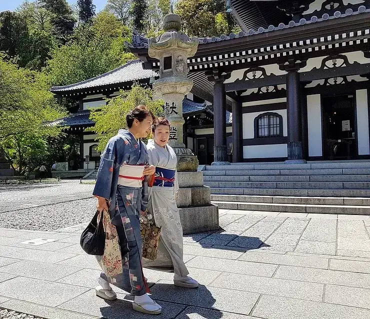Japanese ladies wearing kimonos outside Hasedera Temple in Kamakura