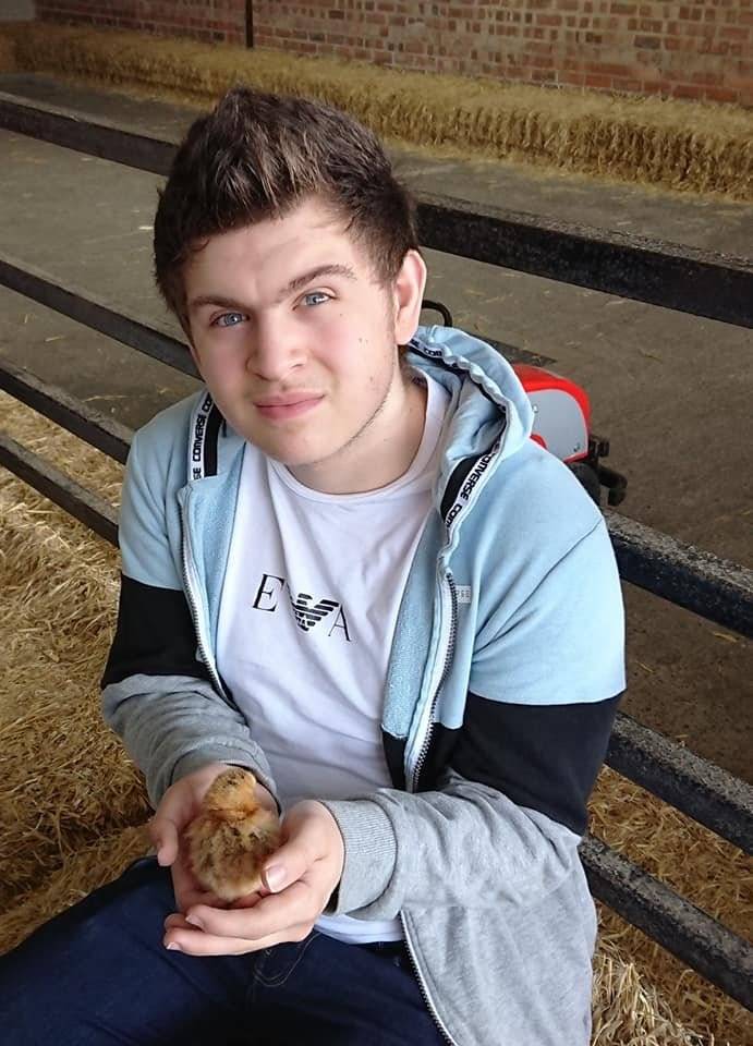 Me holding a baby Chick.