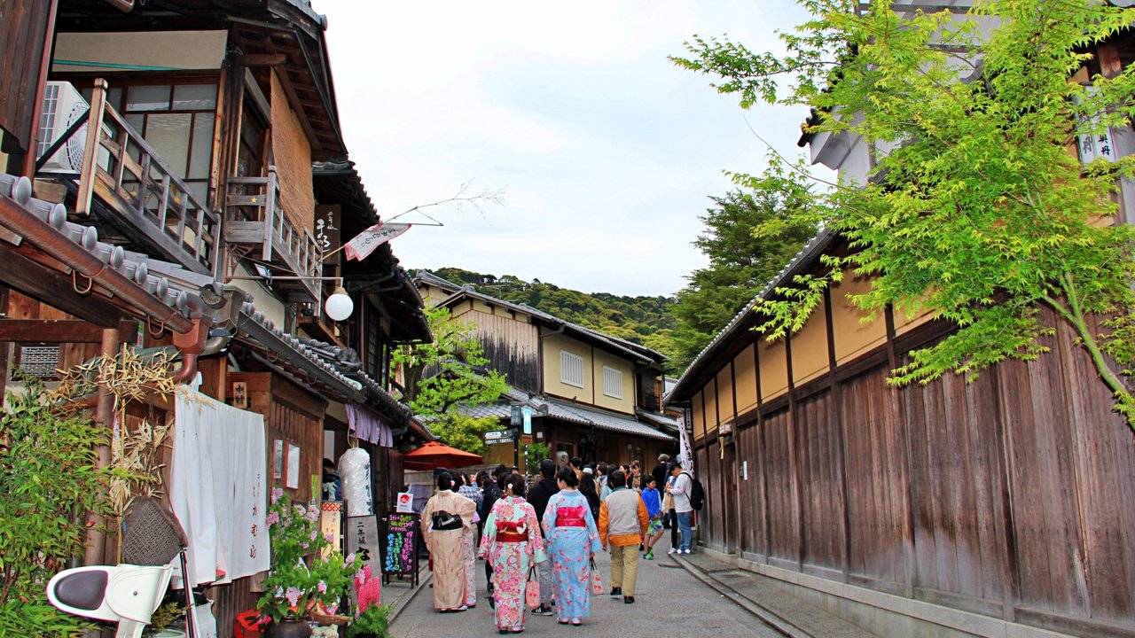 Few tourists in kimono in the small streets of Kyoto
