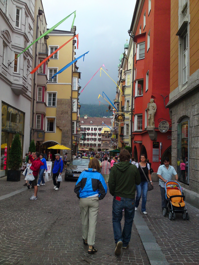 Axel walks in front of me through Innsbruck’s old city center
