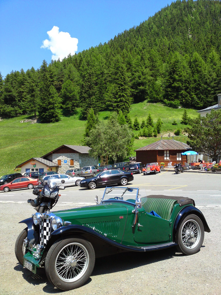My modern iron horse watching antique cars at Col de la Forclaz
