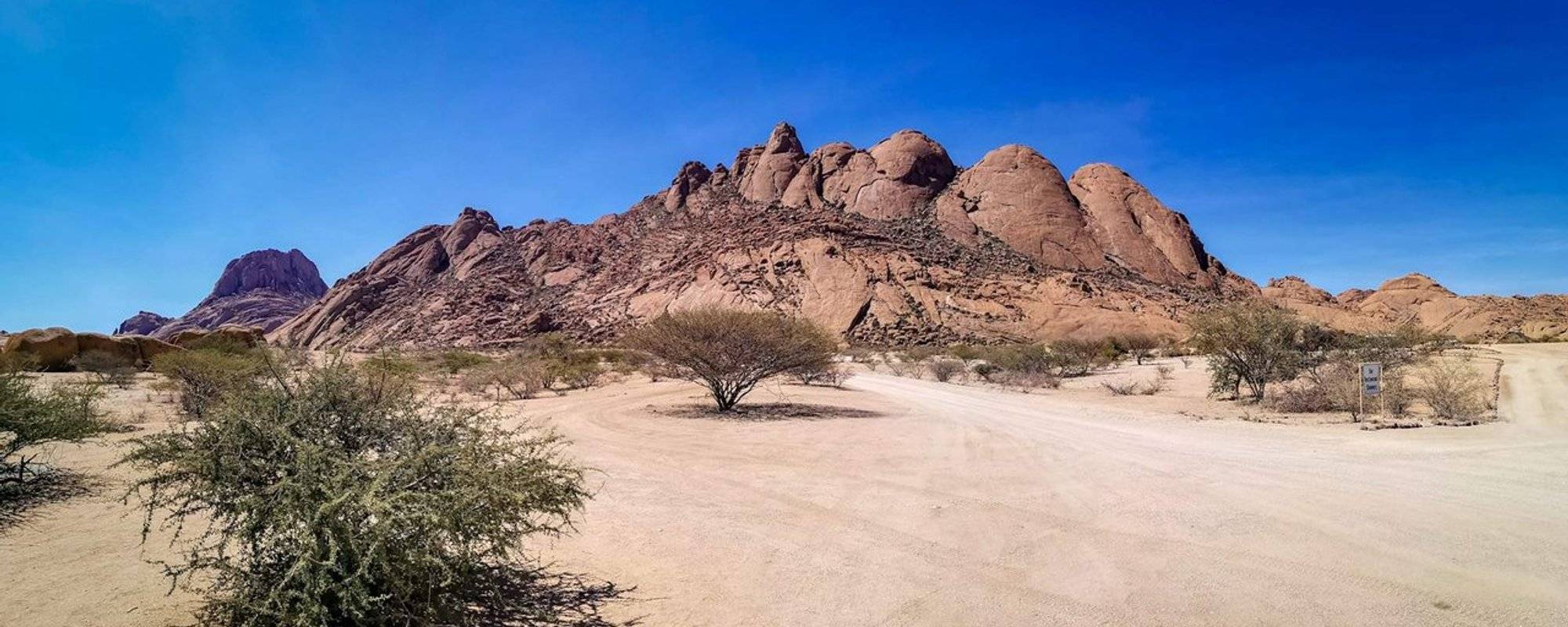 We found 2000+ year old paintings at the Spitzkoppe mountains Namibia - African Adventure.