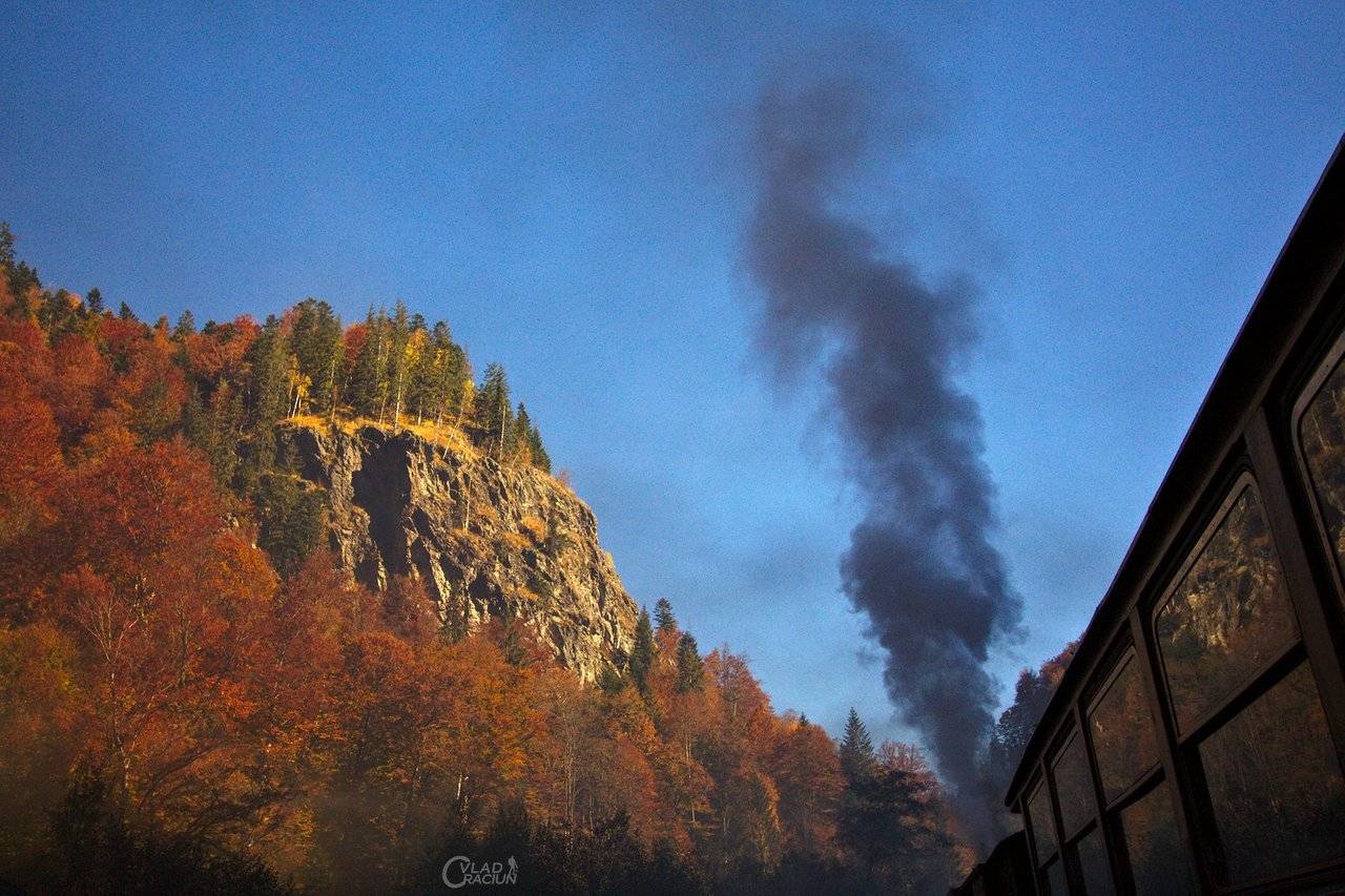 the smoke from a steam engine train