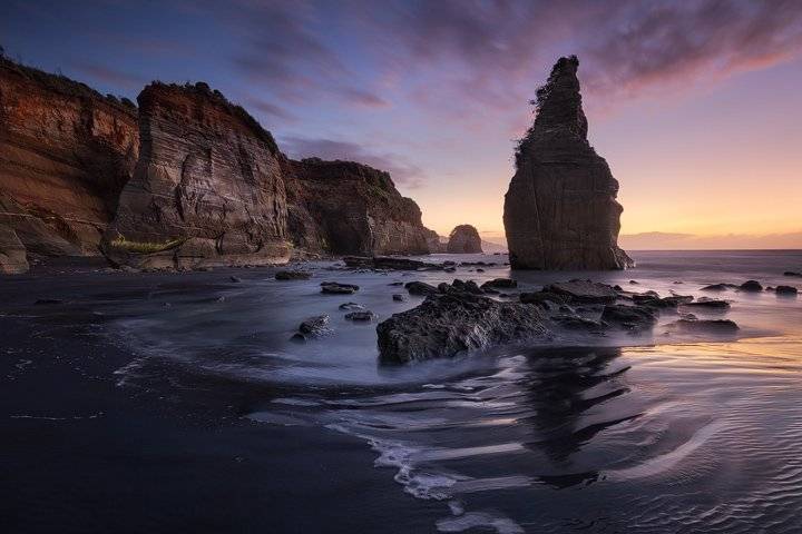 The Three Sisters rock formation at a beach near New Plymouth