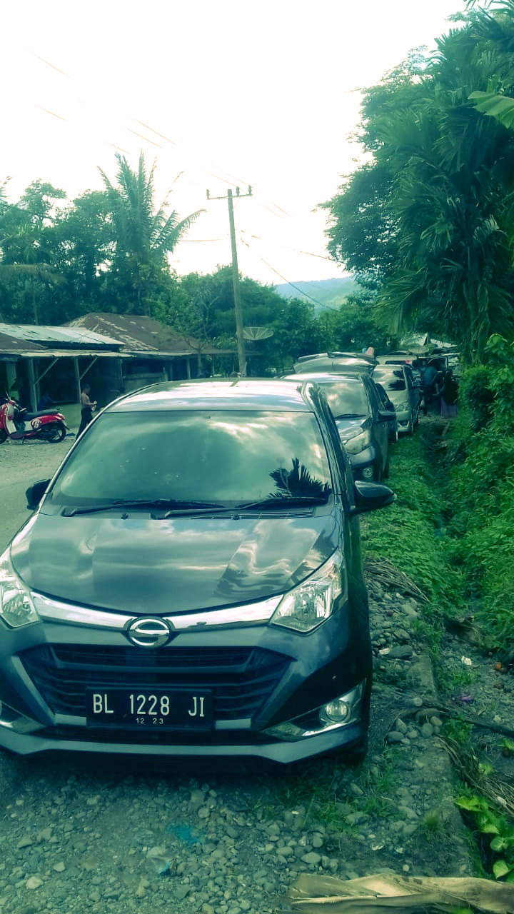Image of a parking lot along the road,