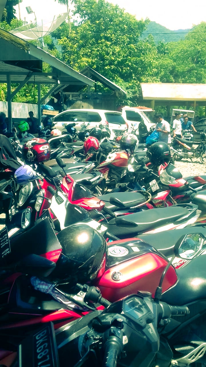 Motorcycle parking in front of the coffee shop: Free.