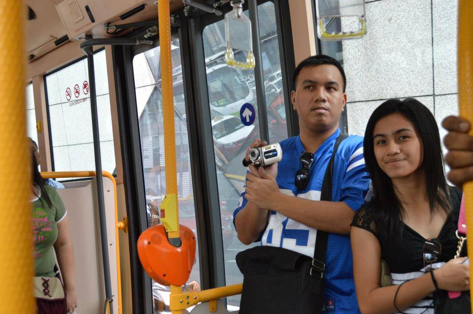 This is me holding my camcorder during our bus ride with my youngest sister Kookee in Malaysia