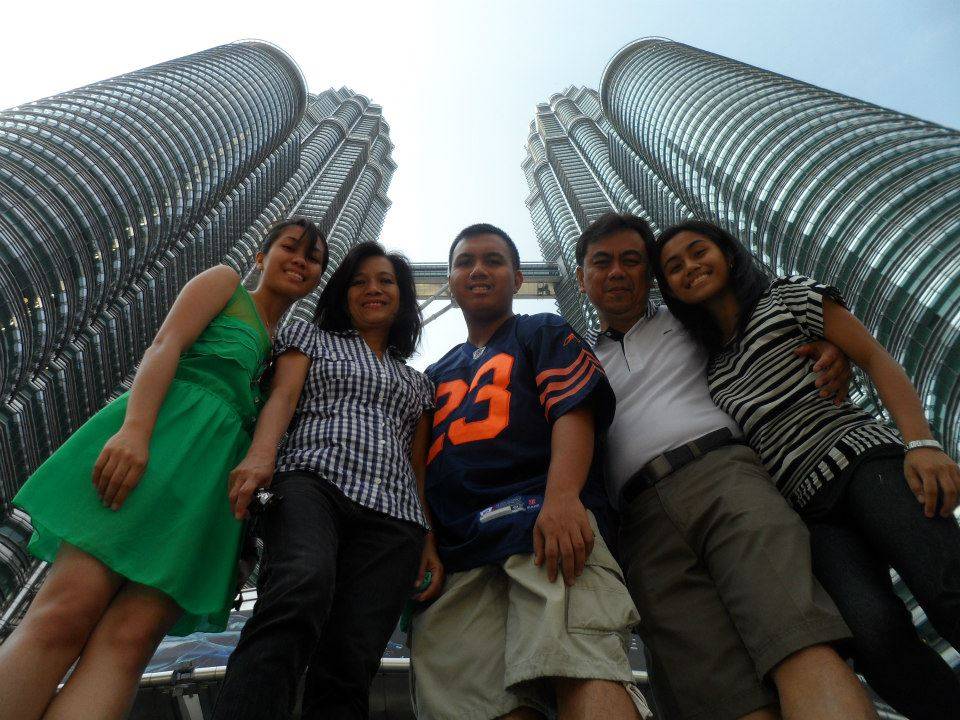 Family picture in the iconic Petronas Twin Towers