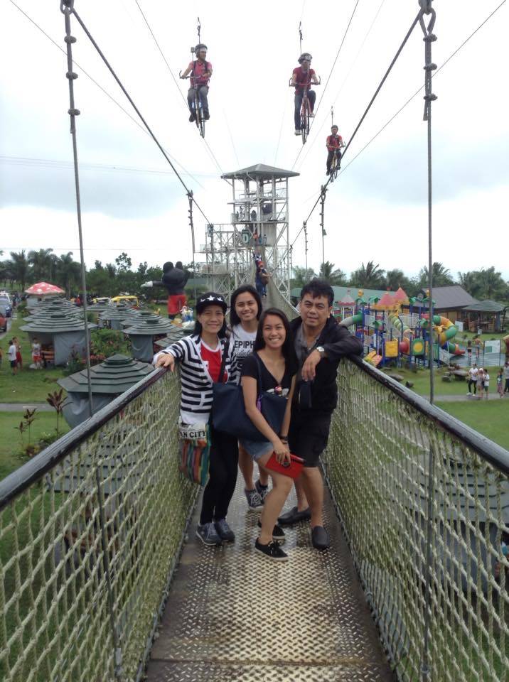 At the rope bridge! Look at the sky bikers above!