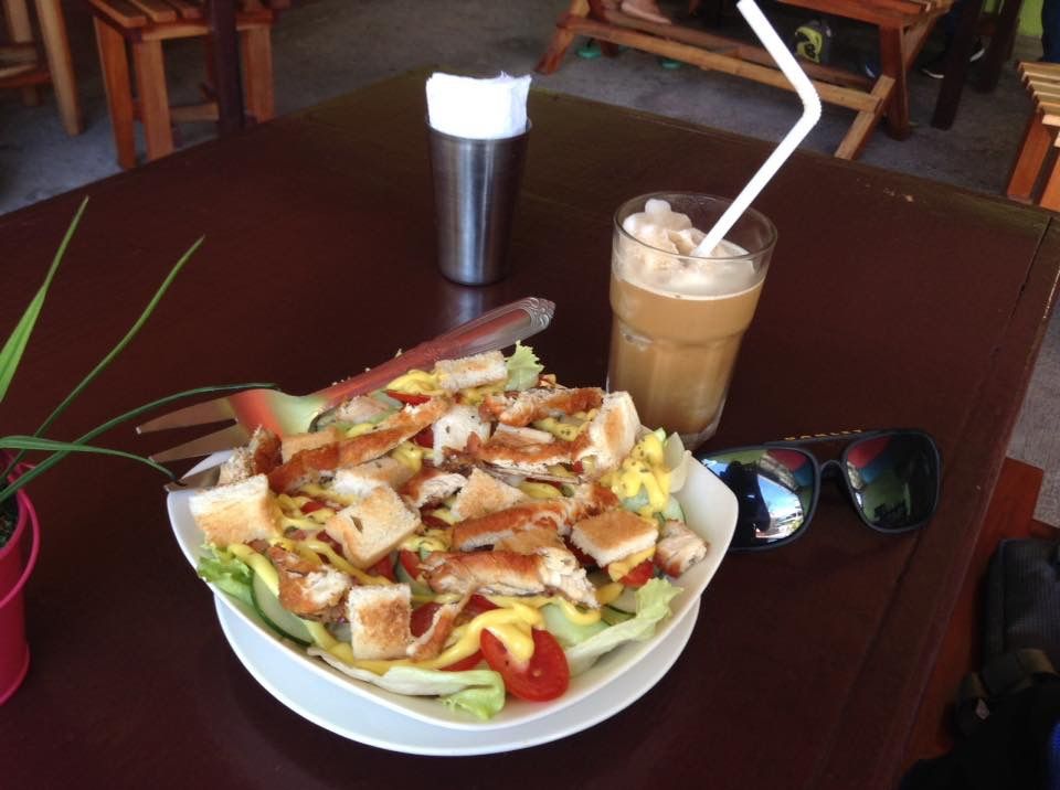 Vegan mode with chicken caesar salad and iced coffee