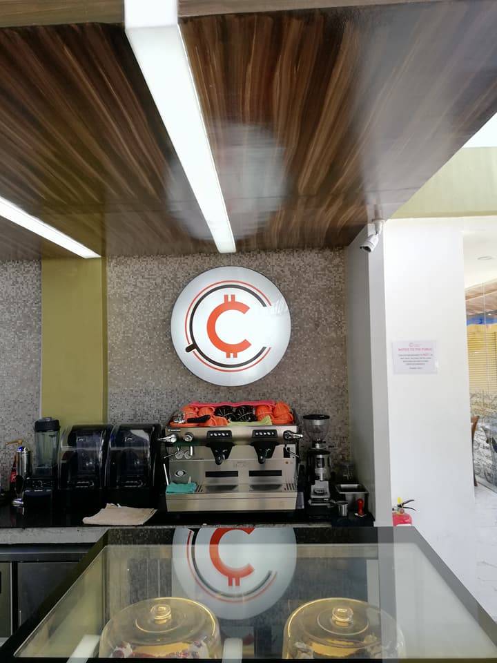 The official logo of Crypto Cafe