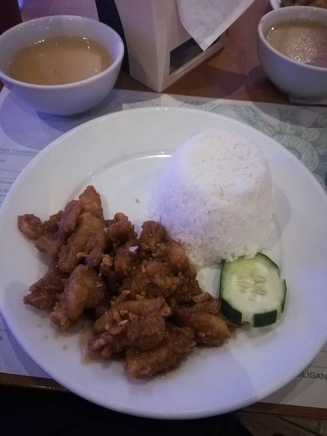 Sweet and sour fish fillet with rice and cucumber