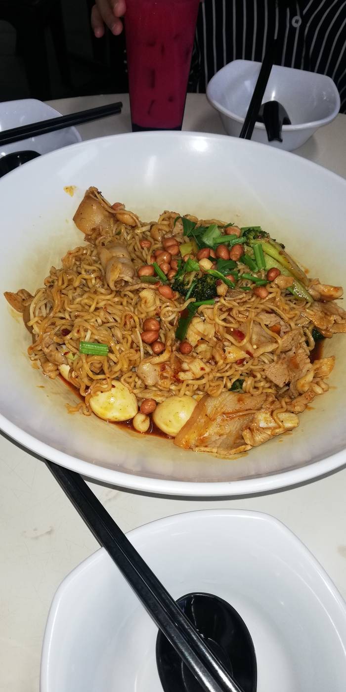 Spicy noodles in an open food court in Ubi
