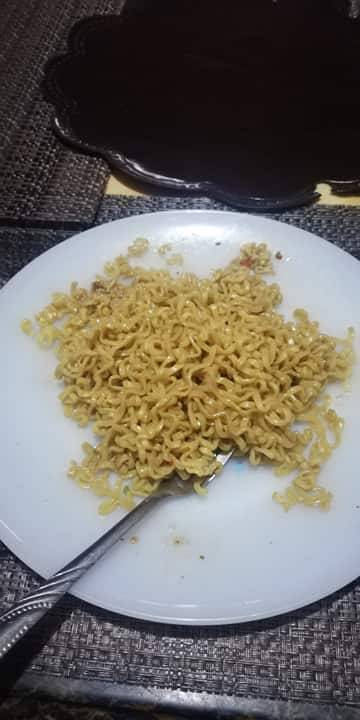 Eating my pancit canton snack at home