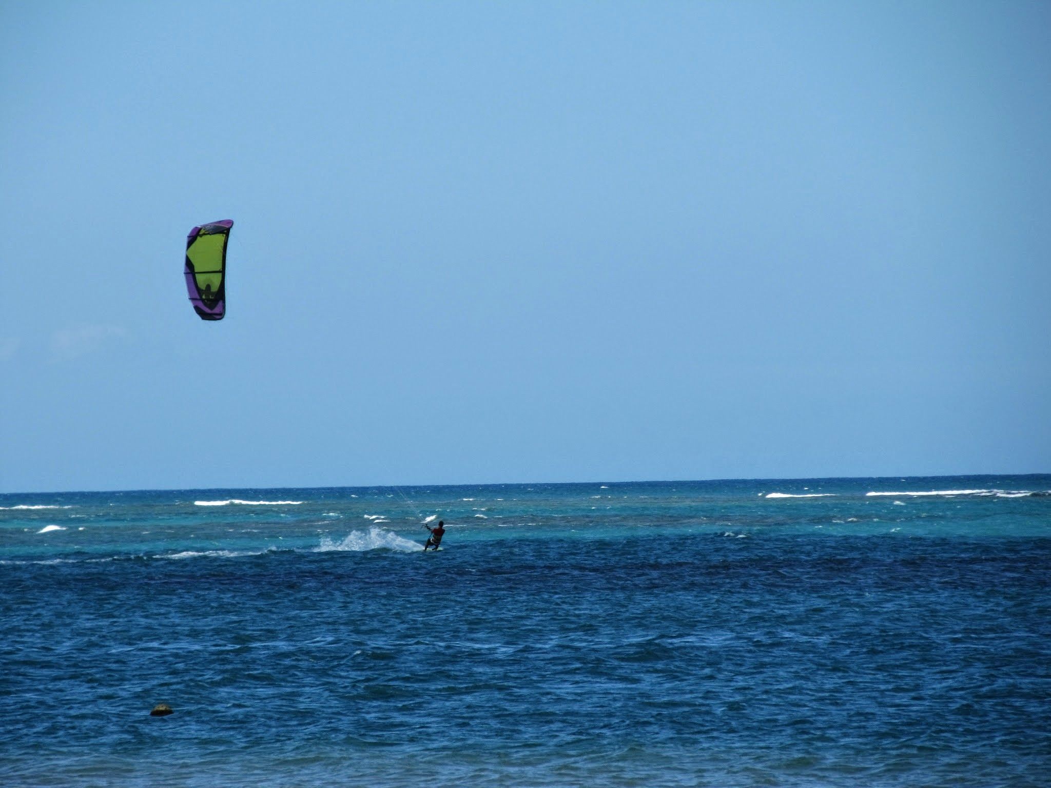 Popisy kitesurfera
