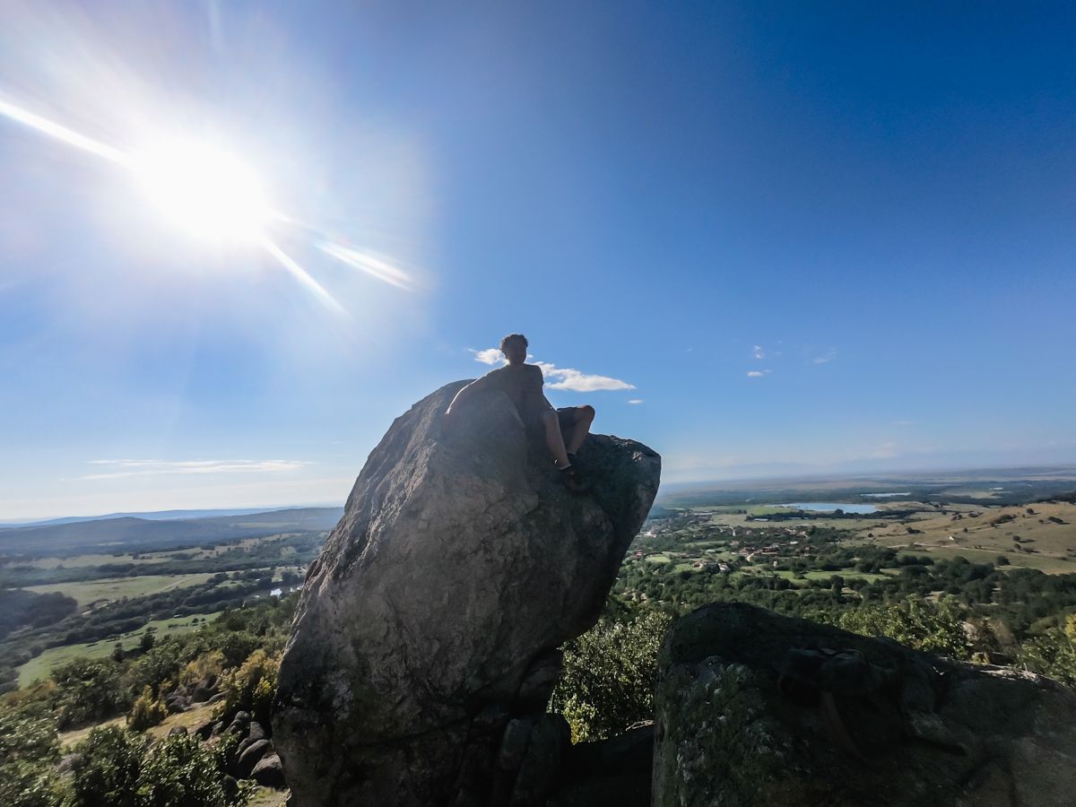 A friend climbed on top of one of the rocks