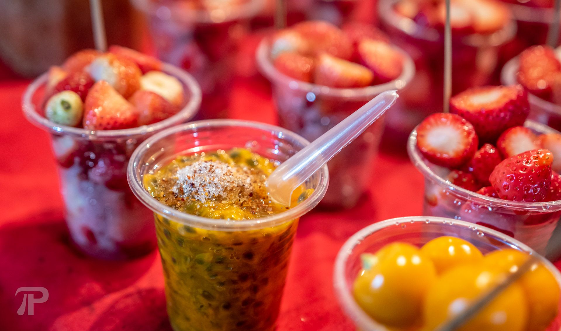 Strawberries, passion fruit and gooseberries for 20 Baht