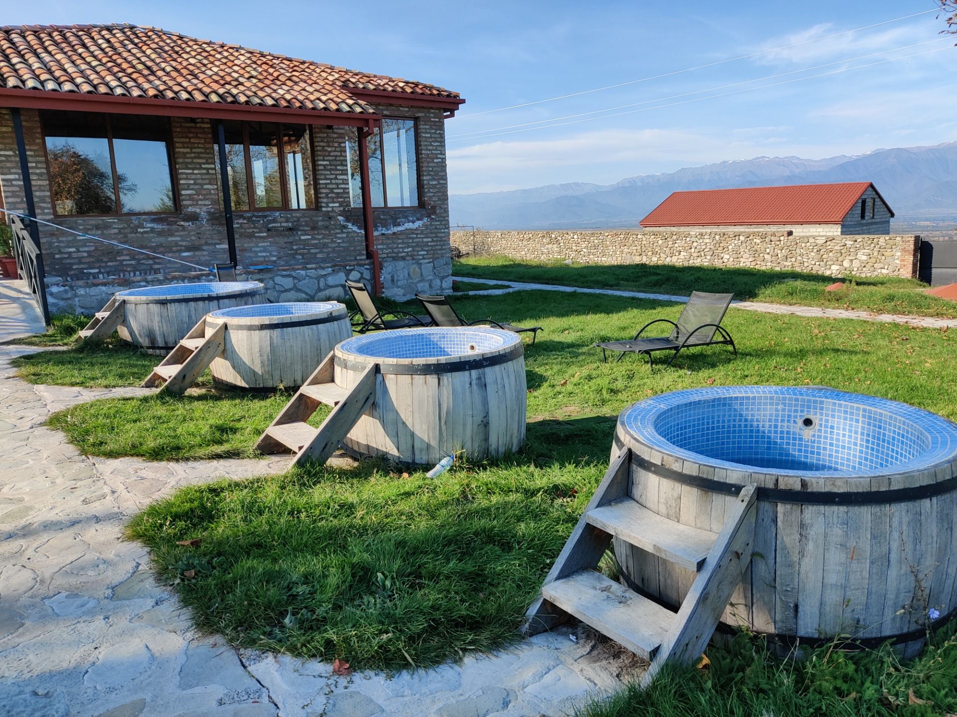 outdoor jacuzzi withe the view of the mountains