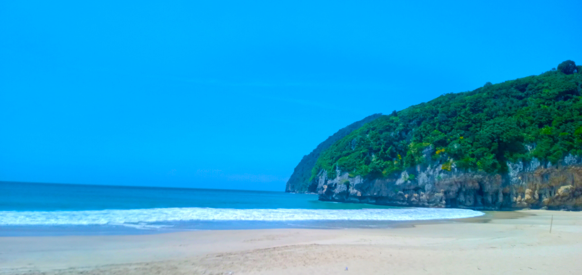 The beach looks very calm and peaceful