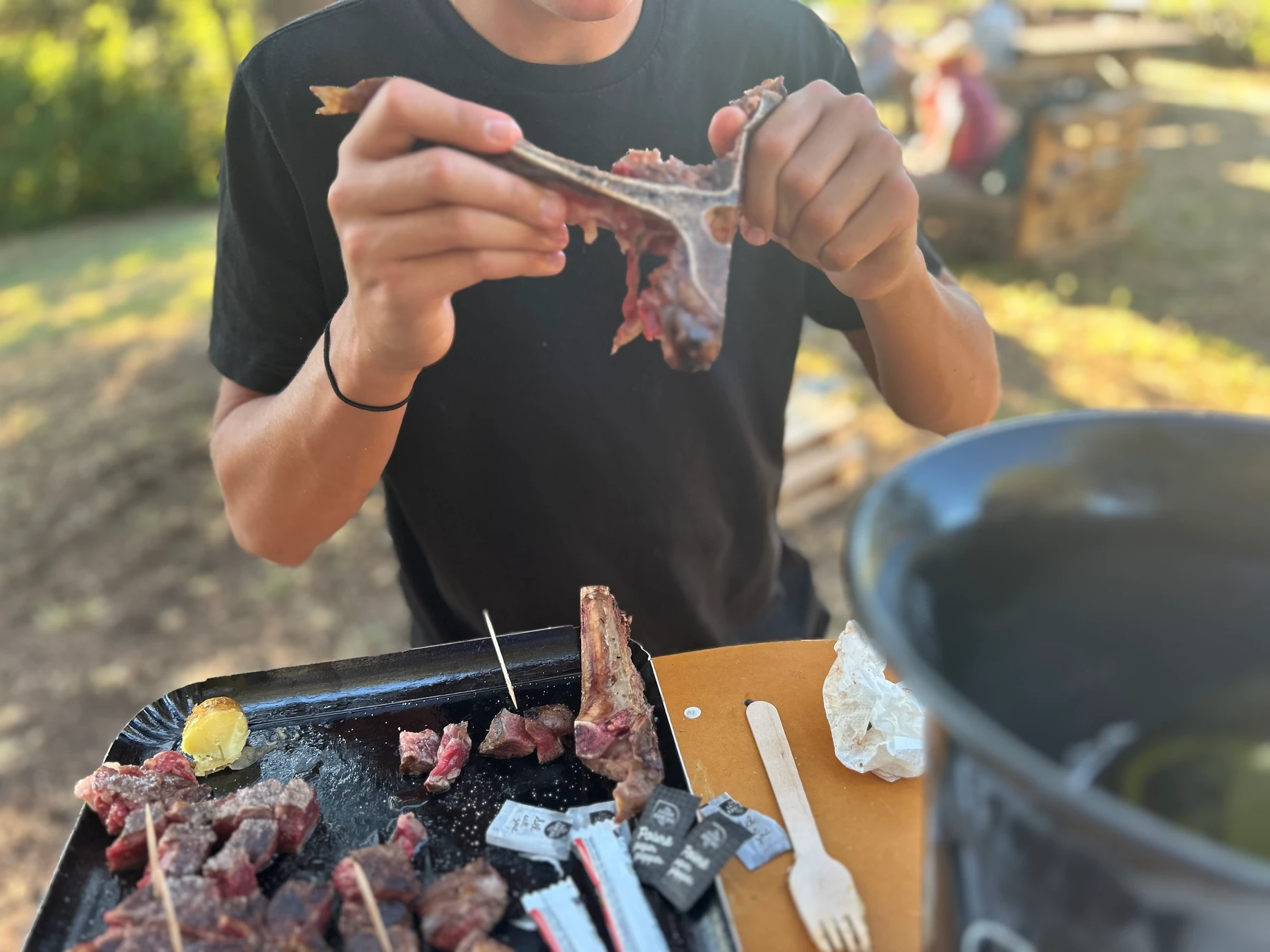 Hungry guy + wood fire grilled steak= happy