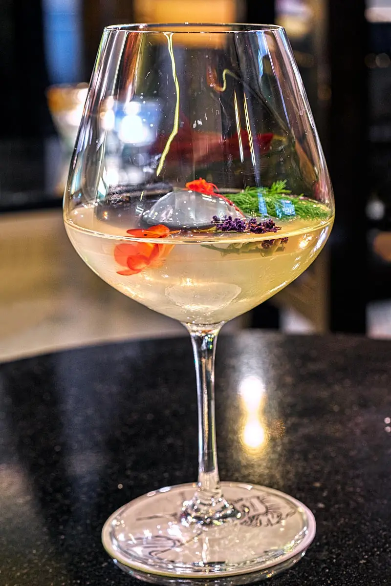 Flower Carrier: Citadelle Original, Diplomatico Planas, Chardonnay, Osmanthus, Lemon, Peychaud’s Bitters