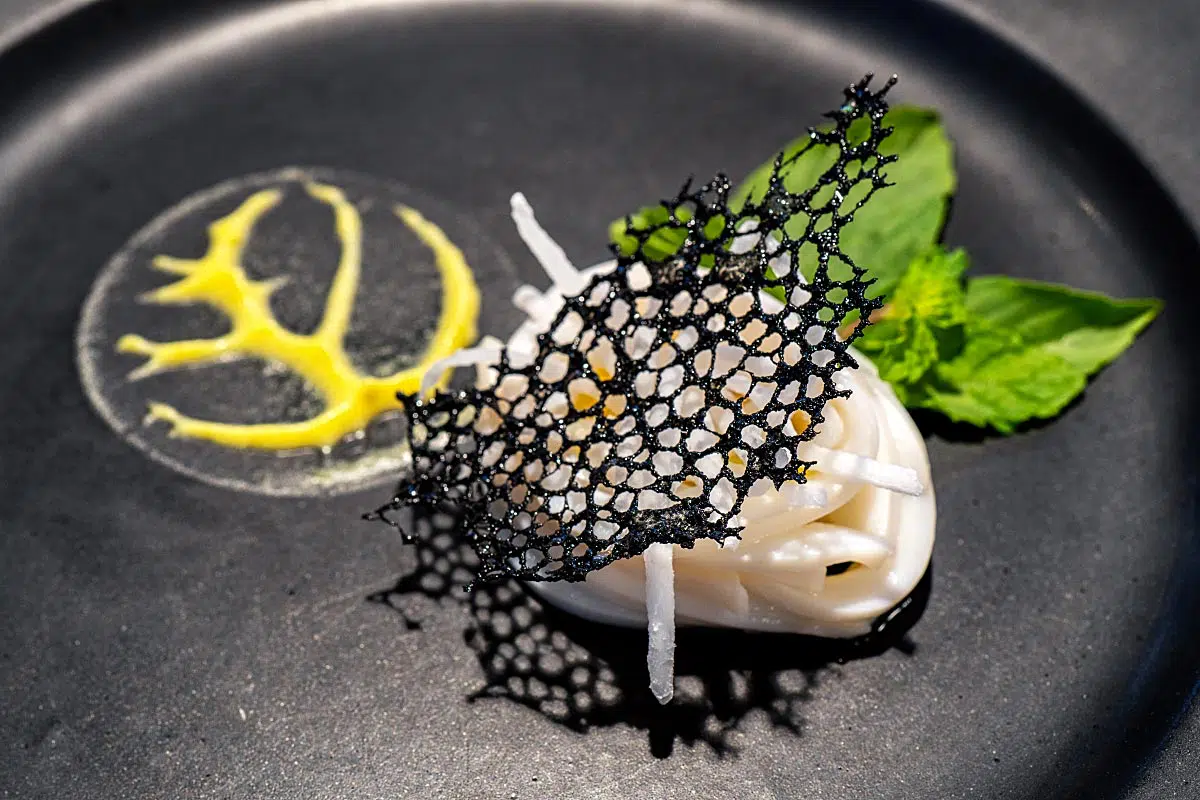 Steamed squid in ginger fish sauce with mango mousse