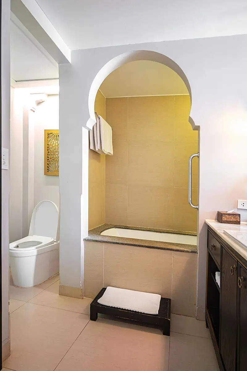 The layout isn’t bad, but some toilet doors would be nice. And if you ask me, the shower would be a much better option than a cramped bathtub.