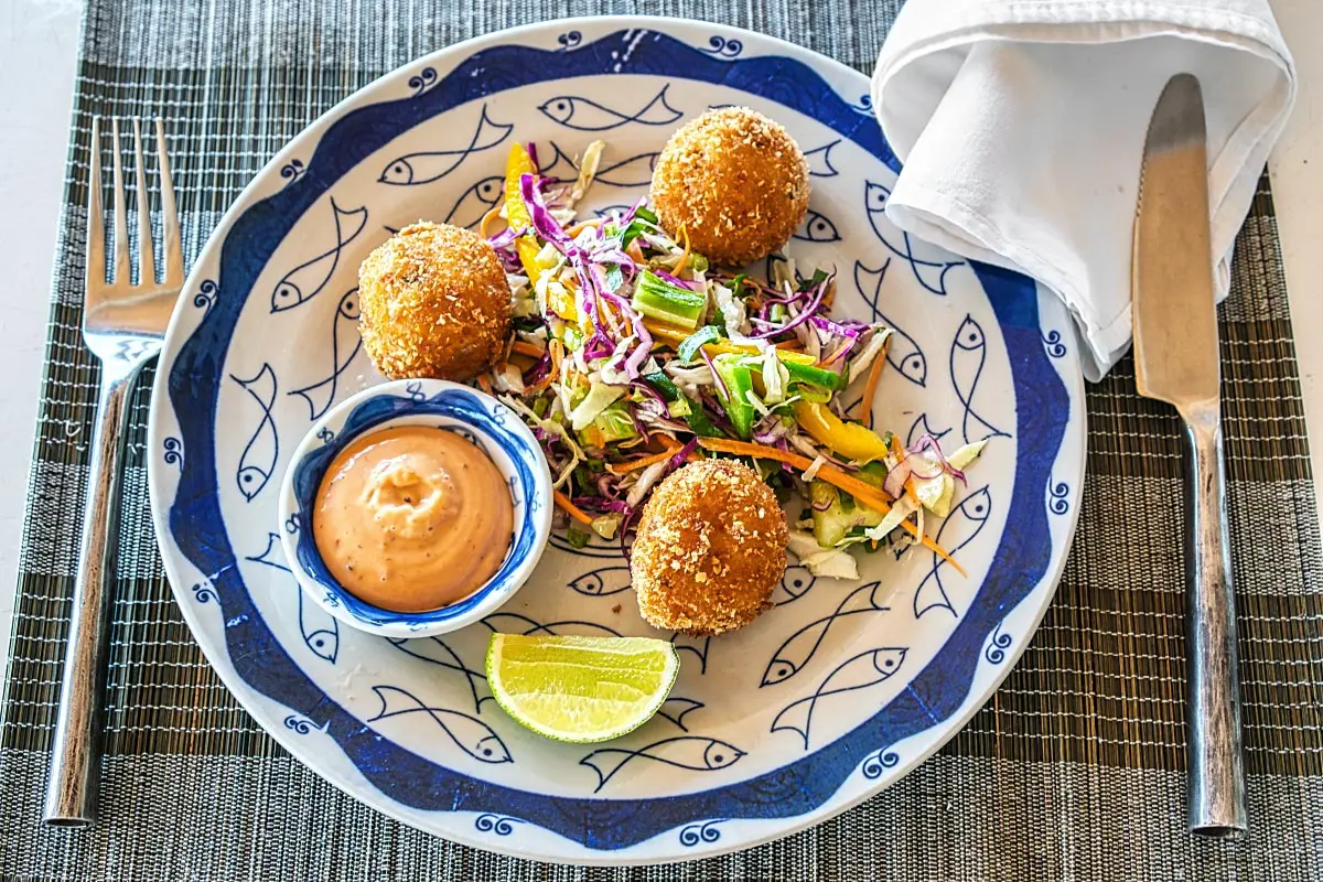 Deep-fried crab cake with refreshing coleslaw and smoky dip
