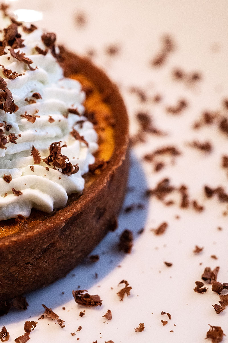 Firm chocolate crust filled with caramel, white chocolate, and mascarpone lime cream.