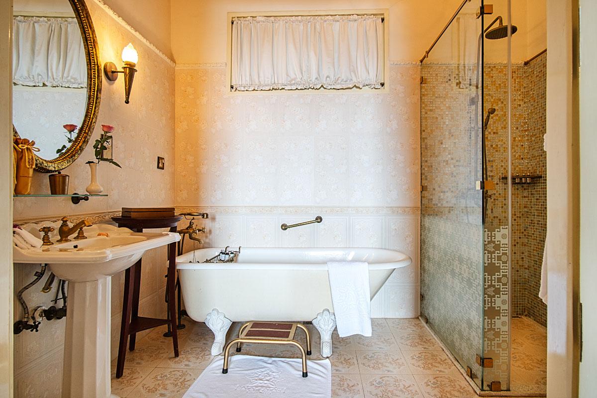 Cozy bathroom with organic toiletries infused with rosemary and mint.