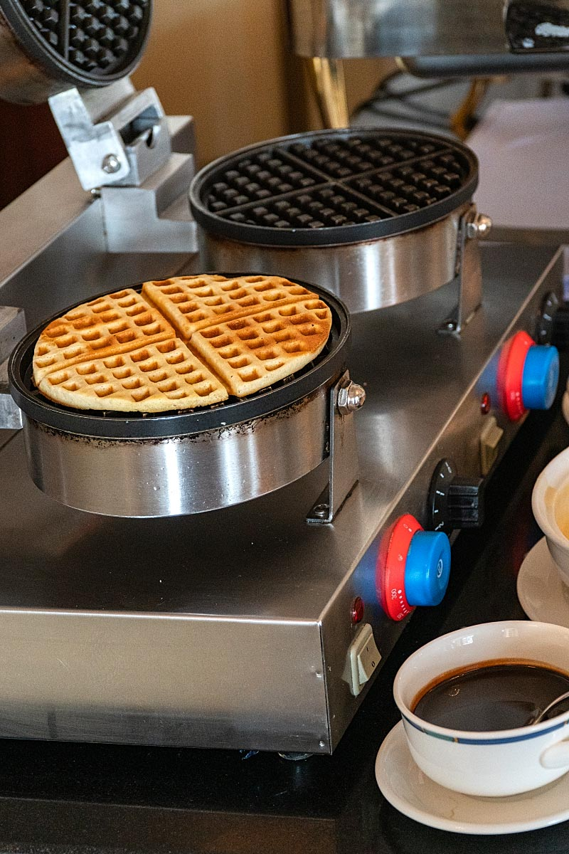 Fresh Belgian waffles with condiments