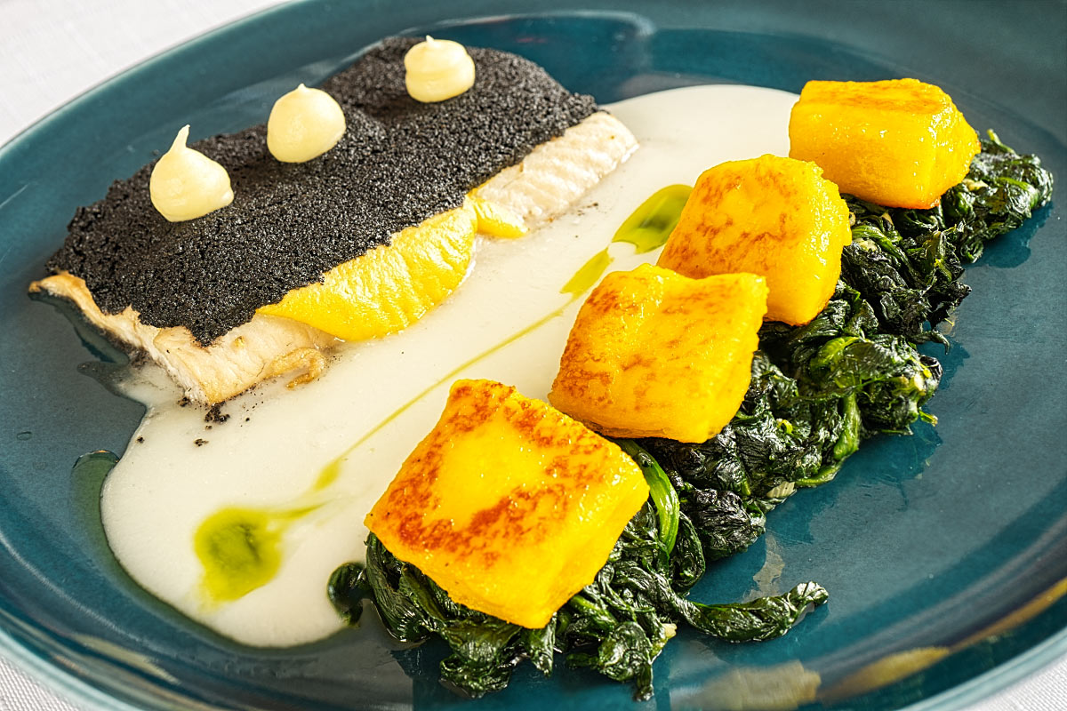 Northern Pike with parsnip cream, spinach, and handmade saffron gnocchi.