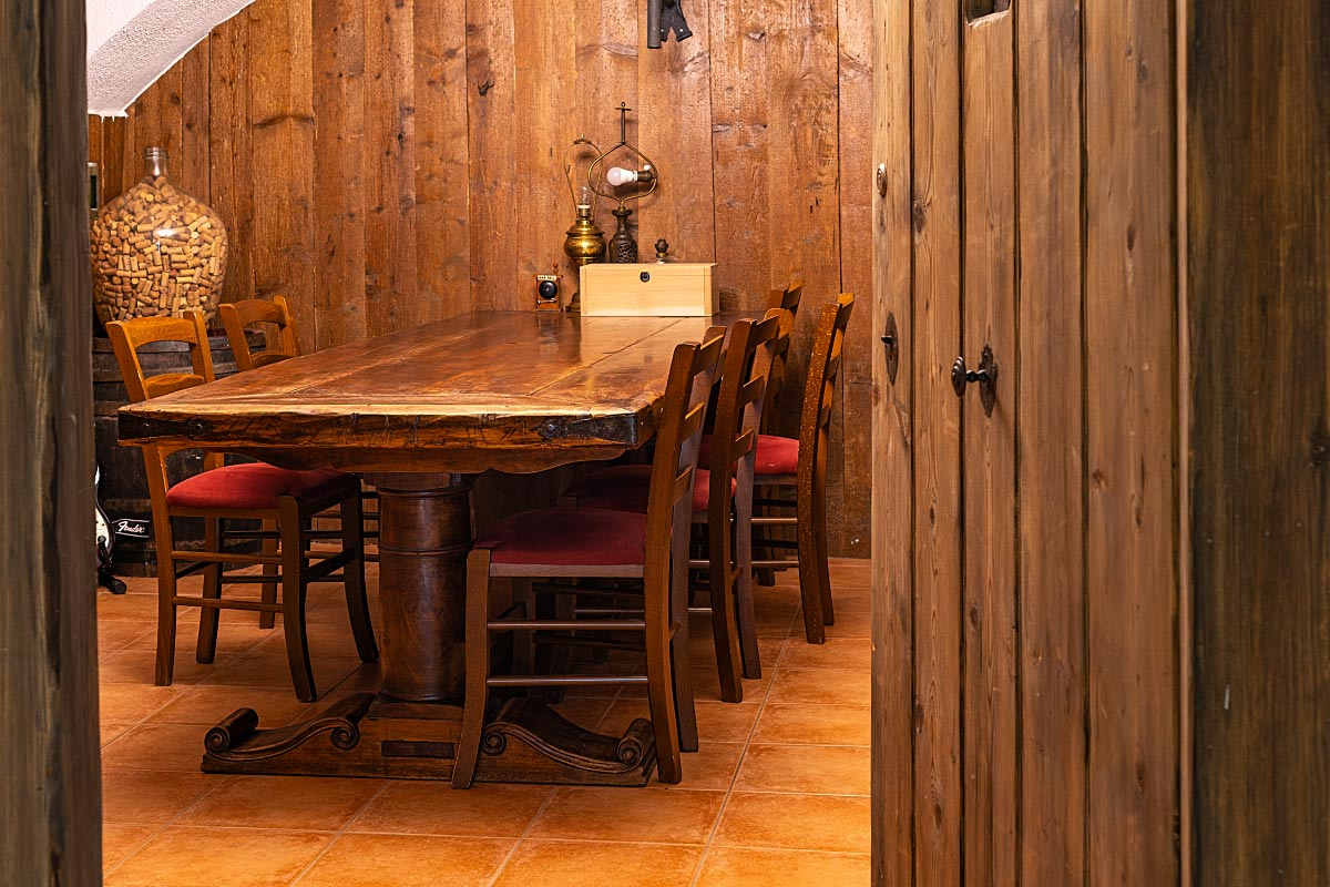 Wine cellar inspired by traditional Slovenian furnishings.