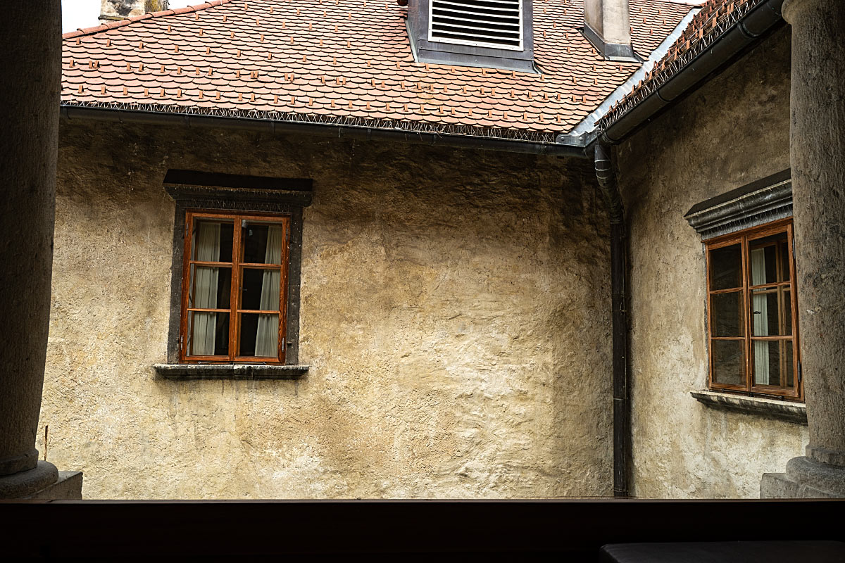 Centuries remain visible in the beautifully imperfect walls of the castle courtyard.