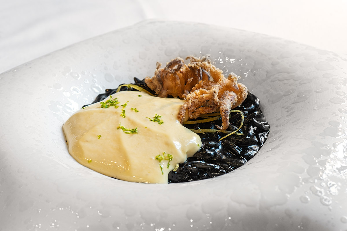 Black orzo, squid ink and tender squid meet the brightness of pickled lemon and the depth of miso foam.