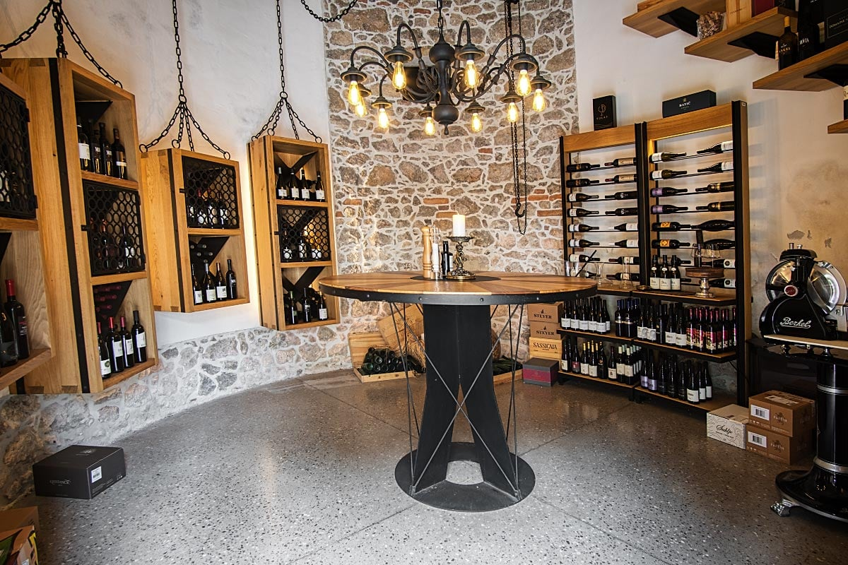 The wine tower combines historic masonry with a broad, carefully presented collection.