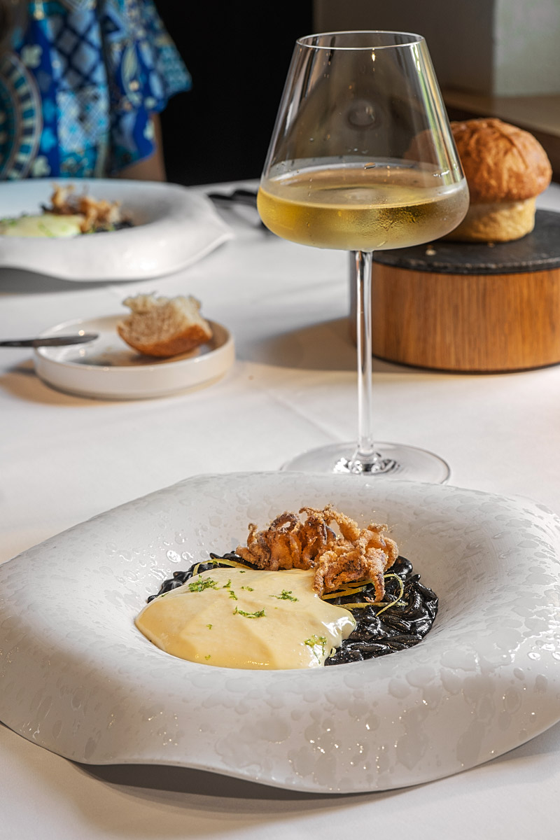 The black orzo course arrived with a mineral Slovenian wine pairing selected by the sommelier.