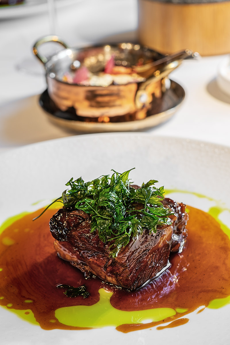 Veal cheeks came with parsley oil and vegetables finished with young kajmak.