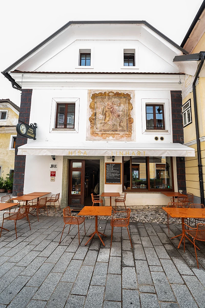 Hiša Linhart faces the pedestrian square in Radovljica’s old town.