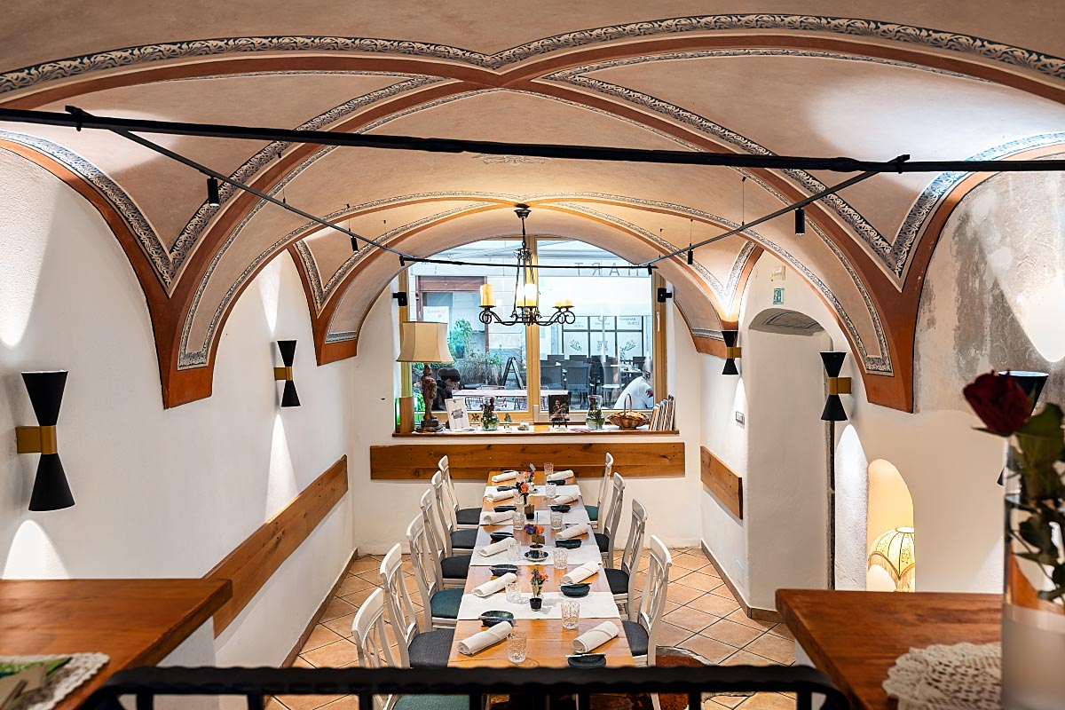 The vaulted dining room is one of the most memorable spaces in the house