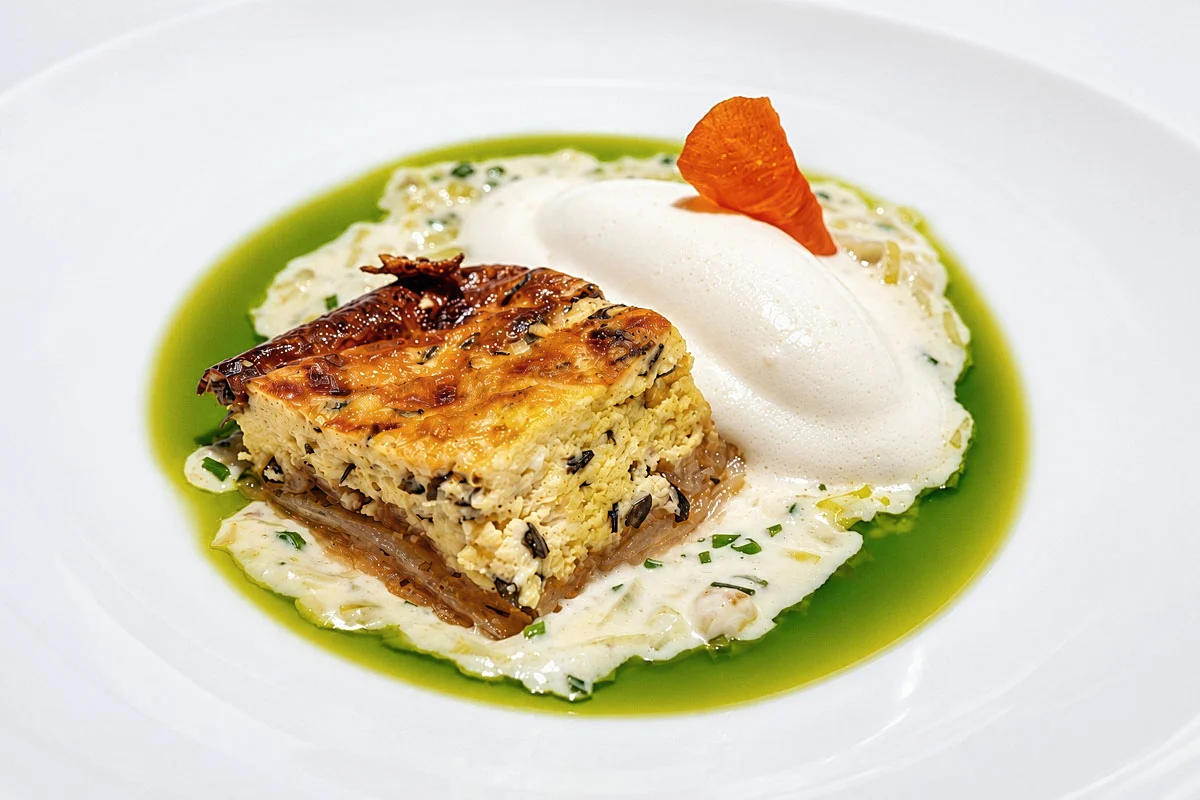 Bandeljc with leek sauce and sour cream ice cream