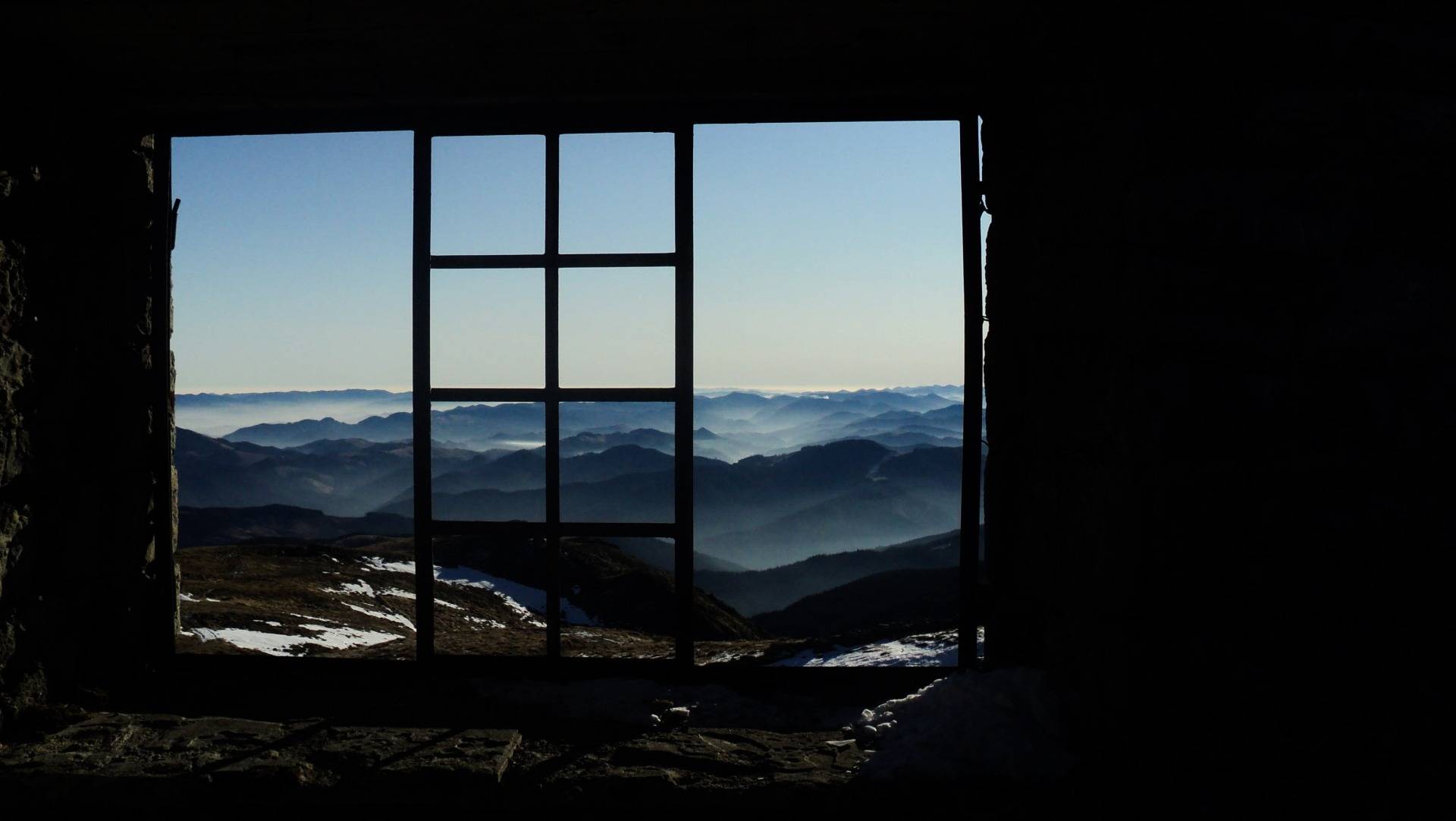 A window in a dilapidated observatory