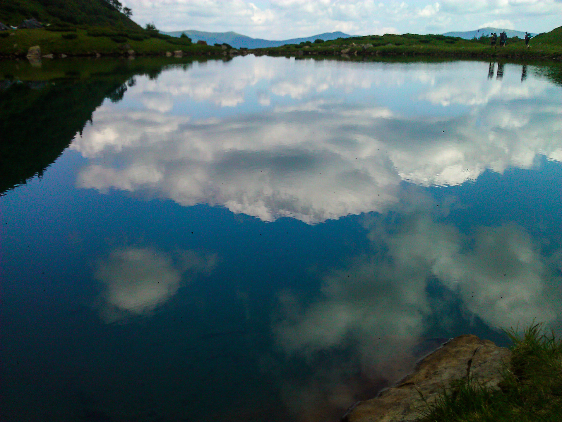 Clouds are reflected in the water mirror
