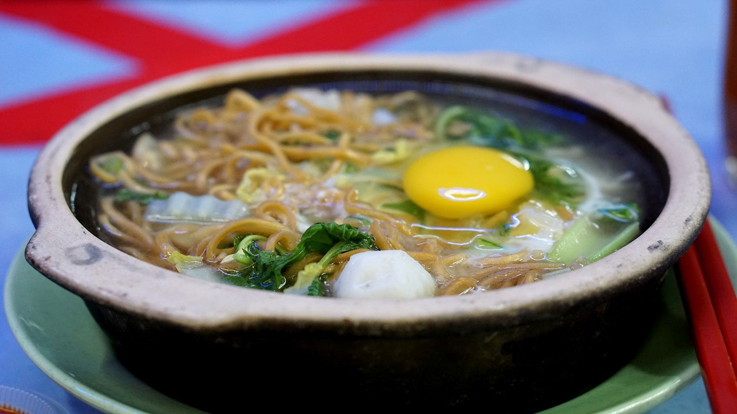 Claypot Yee Mee - yee mee being the brown (pre-fried) noodles cooked in veggie broth with an egg dropped in to be beaten into the soup (Tip: do that before the broth cools)