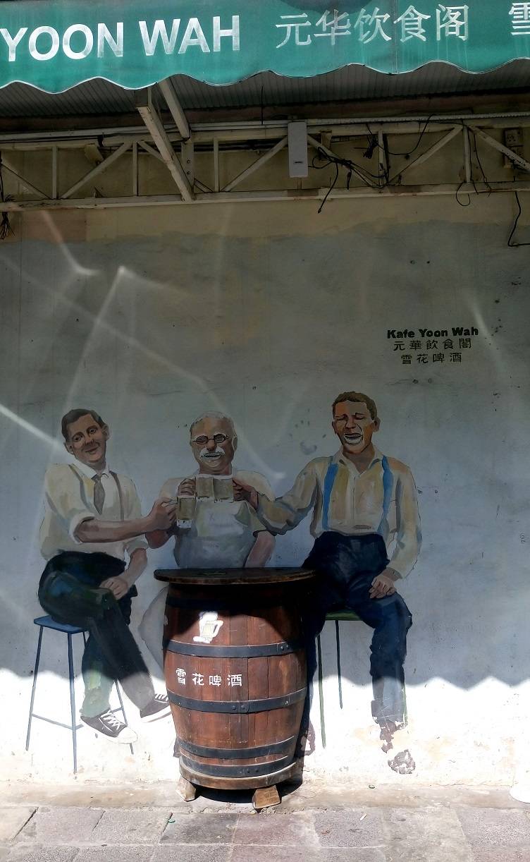 Found this as I parked the car... side wall of a bar/cafe; you can sit your beer down while you join these gentlemen for a chat... 😊