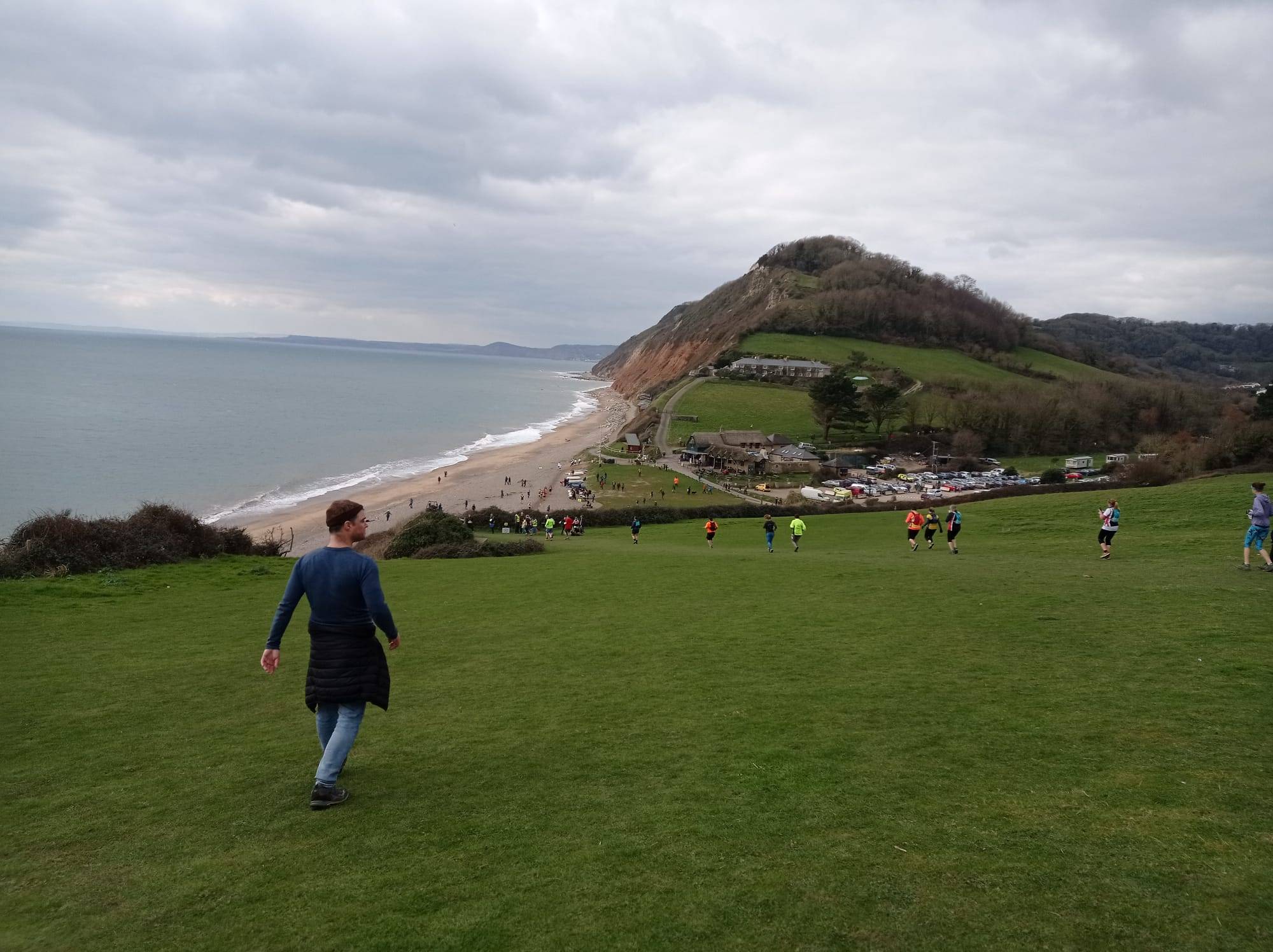 Me walking down the hill towards Branscombe… and some runners too!