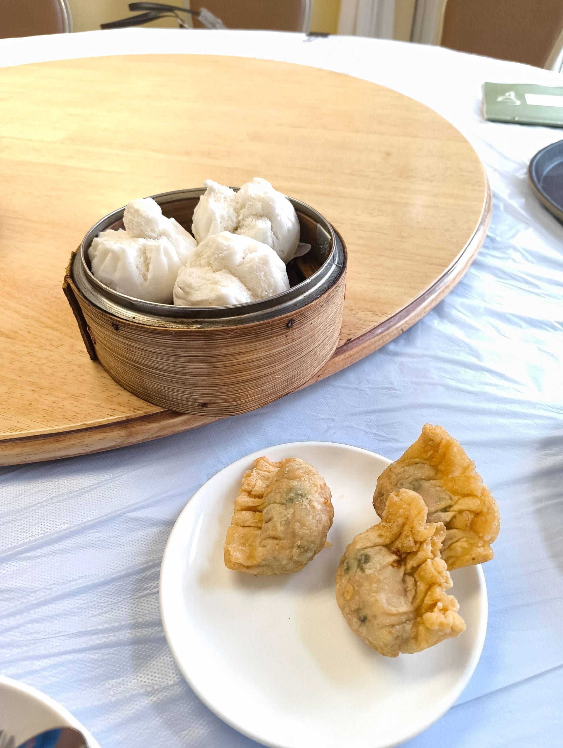Freshly steamed Baos & Dim Sums with spicey Lau Gan Ma (Chilly oil) on a hot & wet afternoon just hits differently